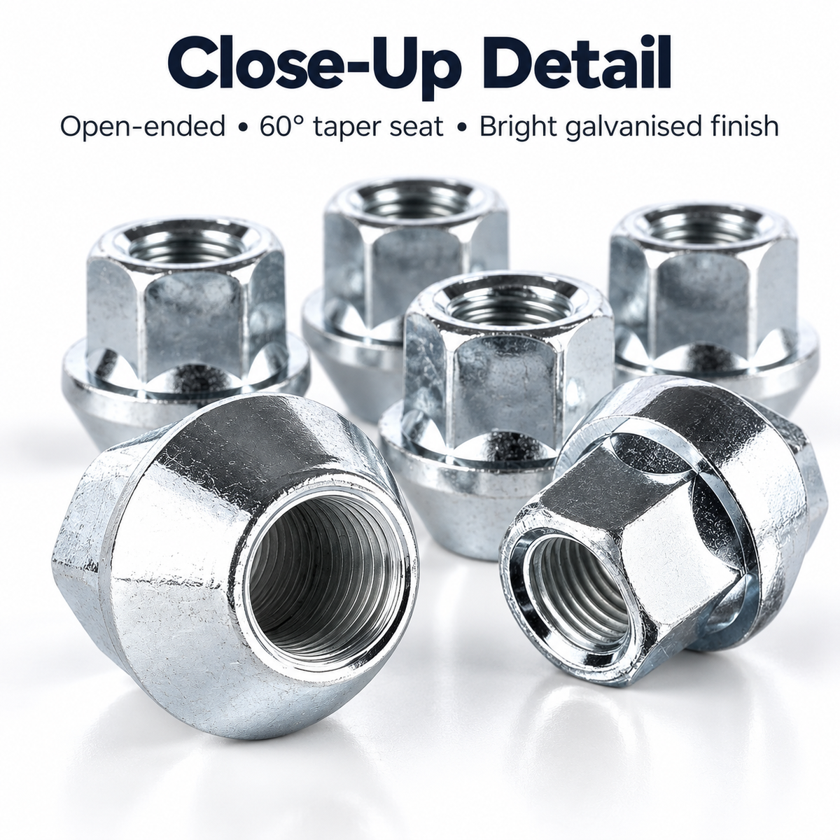 Open-ended galvanised M12x1.25 60 degree taper wheel nuts close-up