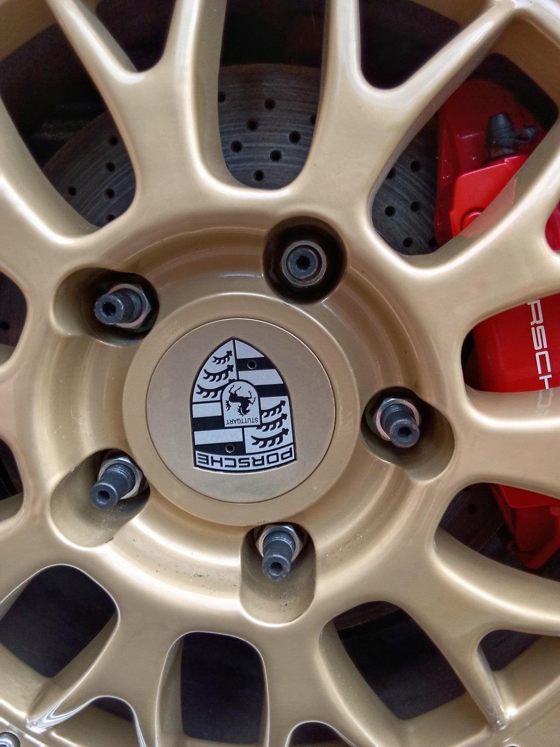 Close-up of PSR9Line Porsche wheel studs fitted through wheel